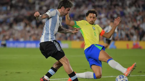 Rodrigo De Paul of Argentina shoots against Marquinhos of Brazil during the South of American FIFA World Cup 2026 Qualifier between Argentina and Brazil.
