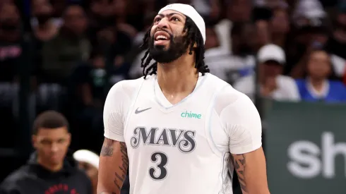 Anthony Davis #3 of the Dallas Mavericks leaves the court with an injury during the third quarter against the Houston Rockets.