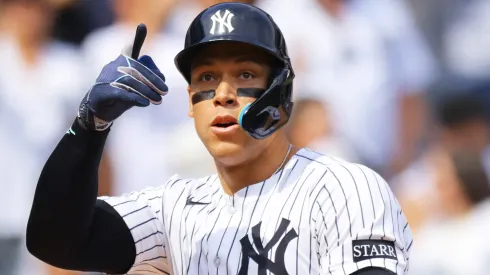 Aaron Judge #99 of the New York Yankees celebrates after hitting a home run in the first inning against Milwaukee Brewers at Yankee Stadium on March 29, 2025 in New York City.