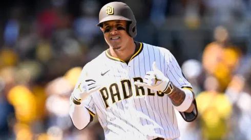 Manny Machado #13 of the San Diego Padres reacts after a double in the third inning against the Atlanta Braves on Opening Day at Petco Park on March 27, 2025 in San Diego, California.
