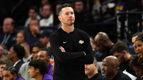 Head coach JJ Redick of the Los Angeles Lakers looks on against the Minnesota Timberwolves in the first quarter at Target Center on December 02, 2024 in Minneapolis, Minnesota.