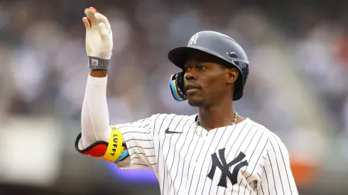 Jazz Chisholm Jr. #13 of the New York Yankees reacts after hitting a single in the sixth inning against the Milwaukee Brewers at Yankee Stadium on March 30, 2025 in New York City.