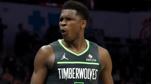 Anthony Edwards #5 of the Minnesota Timberwolves reacts following a three point basket during the first half of the game against the Charlotte Hornets at Spectrum Center on March 05, 2025 in Charlotte, North Carolina.