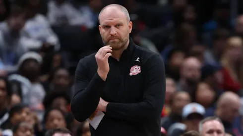 Head coach Taylor Jenkins of the Memphis Grizzlies looks on against the Washington Wizards during the first half at Capital One Arena on December 8, 2024 in Washington, DC.