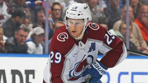 Nathan McKinnon #29 of the Colorado Avalanche skates with the puck against the Toronto Maple Leafs during the first period in an NHL game at Scotiabank Arena on March 19, 2025 in Toronto, Ontario, Canada.