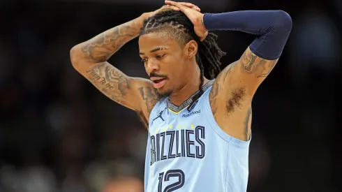Ja Morant #12 of the Memphis Grizzlies reacts during the first half against the Phoenix Suns at FedExForum on March 10, 2025 in Memphis, Tennessee.