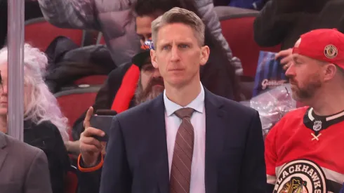 Head coach Kris Knoblauch of the Edmonton Oilers looks on against the Chicago Blackhawks during the second period at the United Center on January 11, 2025 in Chicago, Illinois.