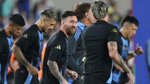 Lionel Messi of Argentina smiles as he speaks to Rodrigo De Paul of Argentina before during the FIFA World Cup 2026 South American Qualifier match between Argentina and Bolivia.