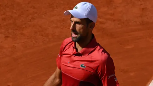 Novak Djokovic of Serbia reacts after he is distracted by a member of the crowd during his match against Francisco Cerundolo.