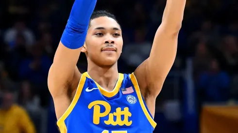 Jaland Lowe #15 of the Pittsburgh Panthers reacts after Blake Hinson #2 of the Pittsburgh Panthers scored his 40th point during the second half against the Louisville Cardinals at Petersen Events Center on February 17, 2024 in Pittsburgh, Pennsylvania. The Pittsburgh Panthers won the game 86-59.