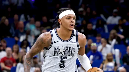 Paolo Banchero #5 of the Orlando Magic brings the ball up court during the first half of the game against the Dallas Mavericks