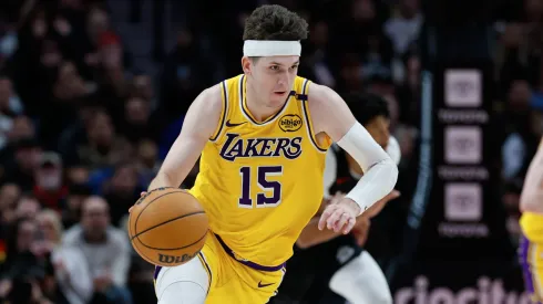 Austin Reaves #15 of the Los Angeles Lakers dribbles during the fourth quarter against the Portland Trail Blazers at Moda Center on February 20, 2025 in Portland, Oregon. The Los Angeles Lakers won 110-102.