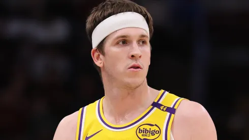 Austin Reaves #15 of the Los Angeles Lakers looks on against the Chicago Bulls during the first half at the United Center on March 27, 2025 in Chicago, Illinois.