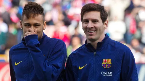 Neymar and Lionel Messi playing with Barcelona during the 2014-15 season.