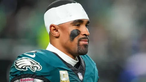 Jalen Hurts #1 of the Philadelphia Eagles looks on from the sidelines as they play the Washington Commanders during the third quarter at Lincoln Financial Field on November 14, 2024 in Philadelphia, Pennsylvania.