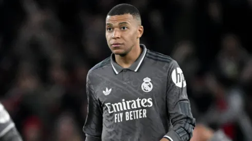 Kylian Mbappe of Real Madrid looks on after Mikel Merino of Arsenal (not pictured) scores his team's third goal during the UEFA Champions League 2024/25 Quarter Final First Leg match between Arsenal FC and Real Madrid C.F. at Emirates Stadium on April 08, 2025 in London, England.