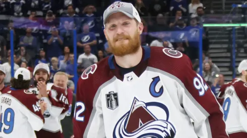 Gabriel Landeskog #92 of the Colorado Avalanche skates for the presentation of the Stanley Cup following the series winning victory over the Tampa Bay Lightning in Game Six of the 2022 NHL Stanley Cup Final.