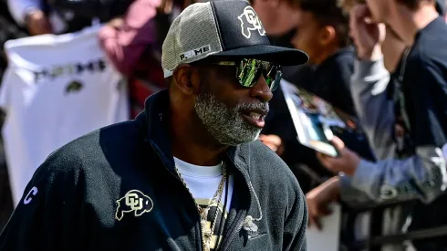 Head coach Deion Sanders of Colorado Buffaloes runs onto the field before the Black and Gold Spring Game at Folsom Field on April 19, 2025 in Boulder, Colorado.