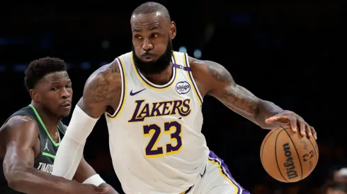 LeBron James #23 of the Los Angeles Lakers drives to the basket against Anthony Edwards #5 of the Minnesota Timberwolves during the first quarter in Game One of the Western Conference First Round NBA Playoffs at Crypto.com Arena on April 19, 2025 in Los Angeles, California.