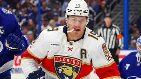 Matthew Tkachuk #19 of the Florida Panthers looks past Victor Hedman #77 of the Tampa Bay Lightning for a loose puck in the first period of Game One of the First Round of the 2025 Stanley Cup Playoffs at the Amalie Arena on April 22, 2025 in Tampa, Florida.