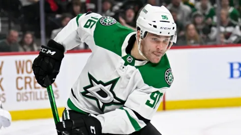 Tyler Seguin #91 of the Dallas Stars skates with the puck in the second period of the game against the Minnesota Wild.