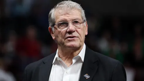 Head coach Geno Auriemma of the Connecticut Huskies looks on at halftime against the Oklahoma Sooners in the Sweet Sixteen round of the NCAA Women's Basketball Tournament in 2025.