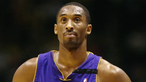 Kobe Bryant #8 of the Los Angeles Lakers looks at the clock during the NBA game against the New Jersey Nets at Continental Airlines Arena on December 19, 2002 in East Rutherford, New Jersey. The Nets won 98-71.