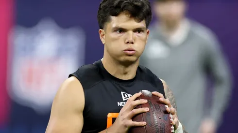 Dillon Gabriel #QB05 of Oregon participates in a drill during the NFL Scouting Combine at Lucas Oil Stadium on March 01, 2025 in Indianapolis, Indiana.