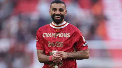Mohamed Salah of Liverpool celebrates the teams victory and confirmation of winning the Premier League title after the Premier League match between Liverpool FC and Tottenham Hotspur FC at Anfield on April 27, 2025 in Liverpool, England.