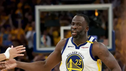 Stephen Curry #30 and Draymond Green #23 of the Golden State Warriors celebrate during the fourth quarter against the Houston Rockets