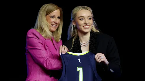 Paige Bueckers and Commissioner Cathy Engelbert.
