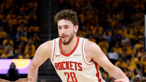 Alperen Sengun #28 of the Houston Rockets dribbles the ball against the Golden State Warriors in Game Four of the Western Conference First Round NBA Playoffs