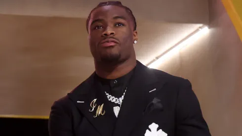 Quarterback Jalen Milroe of Alabama walks onto the stage during the first round of the 2025 NFL Draft at Lambeau Field on April 24, 2025 in Green Bay, Wisconsin.