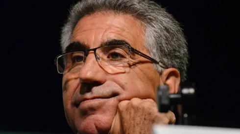 Manuel Orantes listens during a press conference prior to his induction into the International Tennis Hall Of Fame.