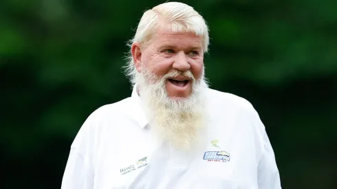 John Daly of the United States smiles on the 10th hole during the first round of the Insperity Invitational at The Woodlands Golf Club on May 4, 2024.