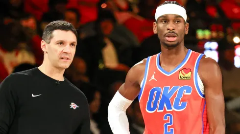Head coach Mark Daigneault and Shai Gilgeous-Alexander #2 of the Oklahoma City Thunder talk in the second half of a semifinal game of the Emirates NBA Cup against the Houston Rockets at T-Mobile Arena on December 14, 2024 in Las Vegas, Nevada. The Thunder defeated the Rockets 111-96.