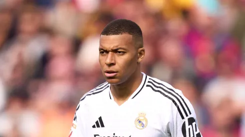 Kylian Mbappe of Real Madrid CF looks on during the LaLiga match between FC Barcelona and Real Madrid CF at Estadi Olimpic Lluis Companys