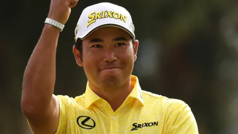 Hideki Matsuyama of Japan reacts during the trophy presentation after putting in to win on the 18th green during the final round of The Genesis Invitational on February 18, 2024.