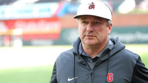 Head coach Kirby Smart of the Georgia Bulldogs walks the field during batting practice prior to the game between the Atlanta Braves and the Los Angeles Dodgers at Truist Park on May 02, 2025 in Atlanta, Georgia.