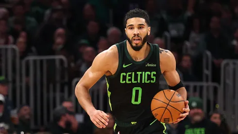 Jayson Tatum #0 of the Boston Celtics dribbles downcourt against the Cleveland Cavaliers