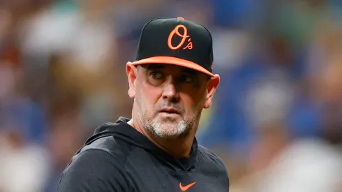 Manager Brandon Hyde #18 of the Baltimore Orioles looks on during the seventh inning against the Tampa Bay Rays at Tropicana Field on August 11, 2024 in St Petersburg, Florida.