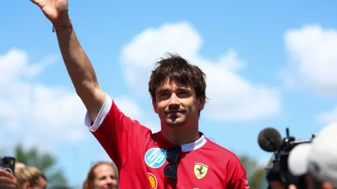 Charles Leclerc of Monaco and Scuderia Ferrari waves on the drivers parade prior to the F1 Grand Prix of Emilia-Romagna at Autodromo Internazionale Enzo e Dino Ferrari on May 18, 2025 in Imola, Italy.