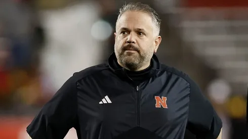 Trev Alberts Athletic Director for the Nebraska Cornhuskers talks with head coach Matt Rhule before the game at Camp Randall Stadium on November 18, 2023 in Madison, Wisconsin.