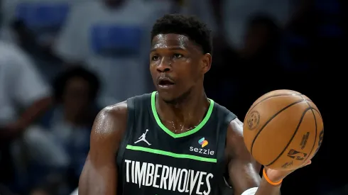 Anthony Edwards #5 of the Minnesota Timberwolves passes the ball against Cason Wallace #22 of the Oklahoma City Thunder during the first quarter in Game One of the Western Conference Finals of the 2025 NBA Playoffs