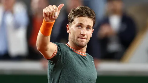 Casper Ruud of Denmark celebrates winning match point against Taylor Fritz of United States in the Men's Singles fourth round match during Day Nine of the 2024 French Open.