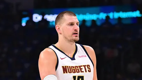 Nikola Jokic #15 of the Denver Nuggets walks down the floor during the first half of game seven of the Western Conference semifinals against the Oklahoma City Thunder