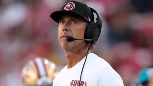 Head coach Kyle Shanahan of the San Francisco 49ers looks on from the sidelines against the New Orleans Saints during the second half of a preseason game at Levi's Stadium on August 18, 2024 in Santa Clara, California.
