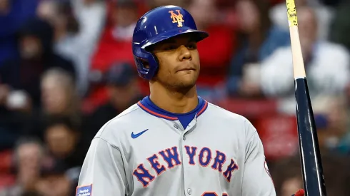 Juan Soto #22 of the New York Mets flips his bat as he heads for the dugout after striking out against the Boston Red Sox.