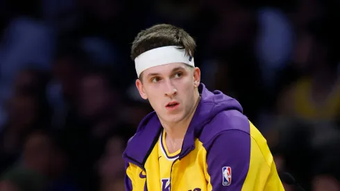 Austin Reaves #15 of the Los Angeles Lakers waits at the scorer's desk during a 103-96 loss to the Minnesota Timberwolves in Game Five of the Western Conference First Round NBA Playoffs