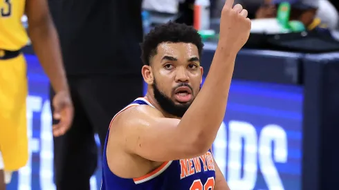 Karl-Anthony Towns #32 of the New York Knicks reacts against the Indiana Pacers during the fourth quarter in Game Three of the Eastern Conference Finals of the 2025 NBA Playoffs